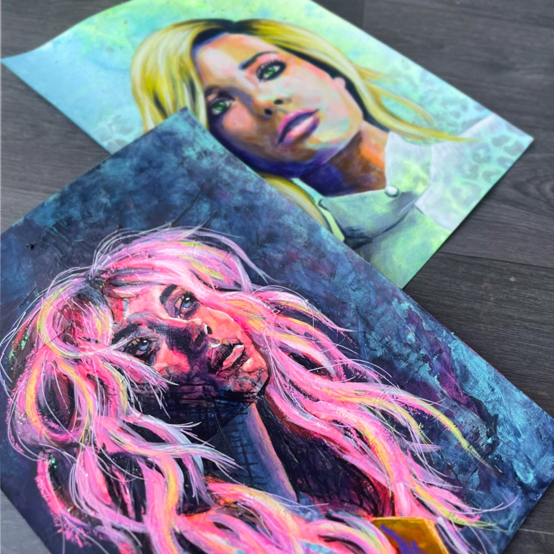 Two artworks created during a mixed media portraits workshop, featuring colorful, textured portraiture.