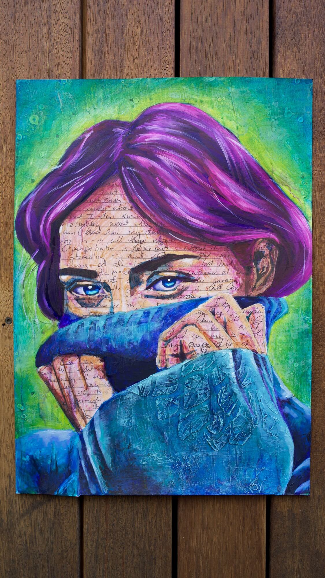 mixed media portrait of a woman with writing on her skin with purple hair