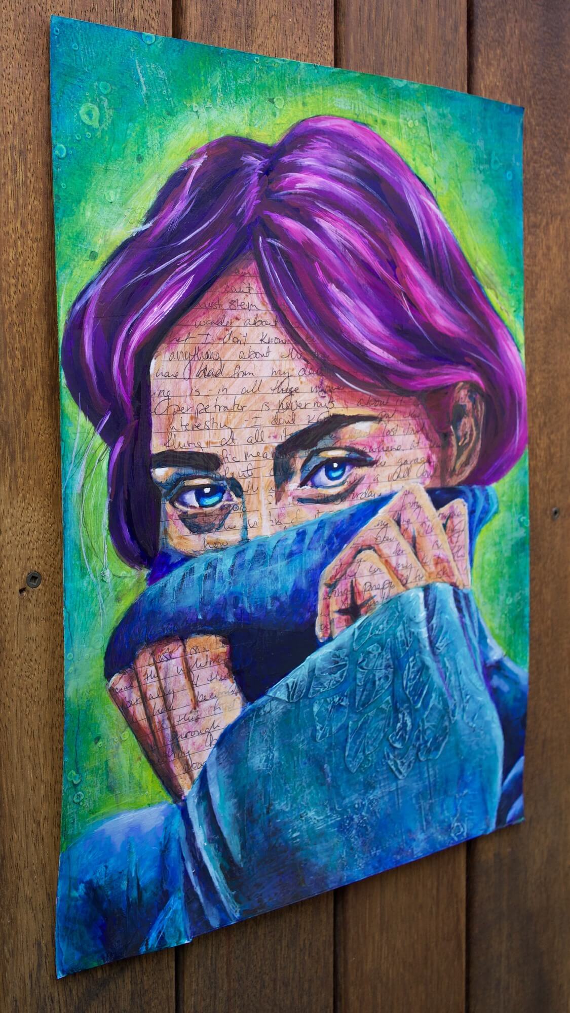 mixed media portrait of a woman with writing on her skin with purple hair