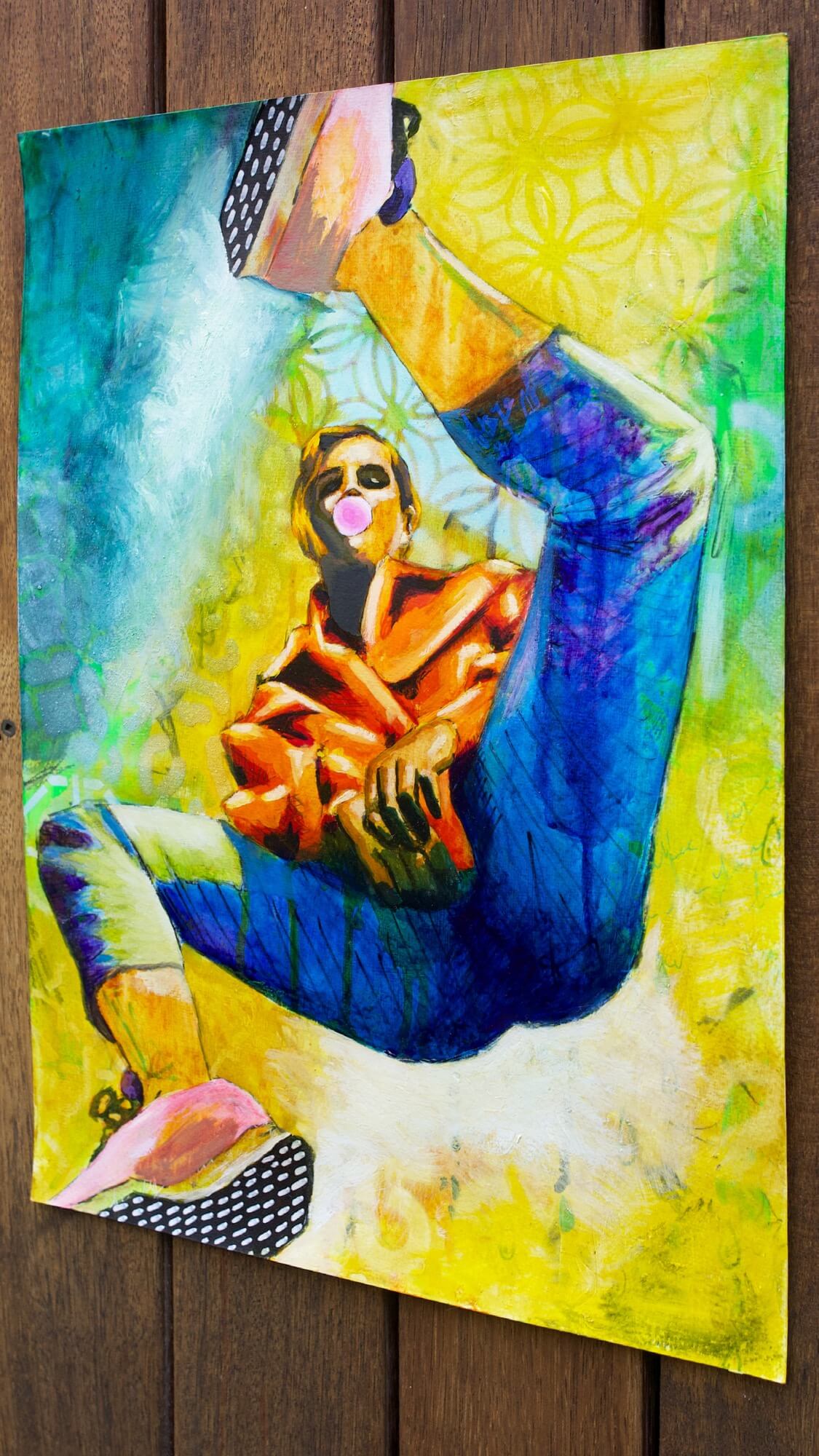 mixed media painting of a woman spinning in air in yellow and blue