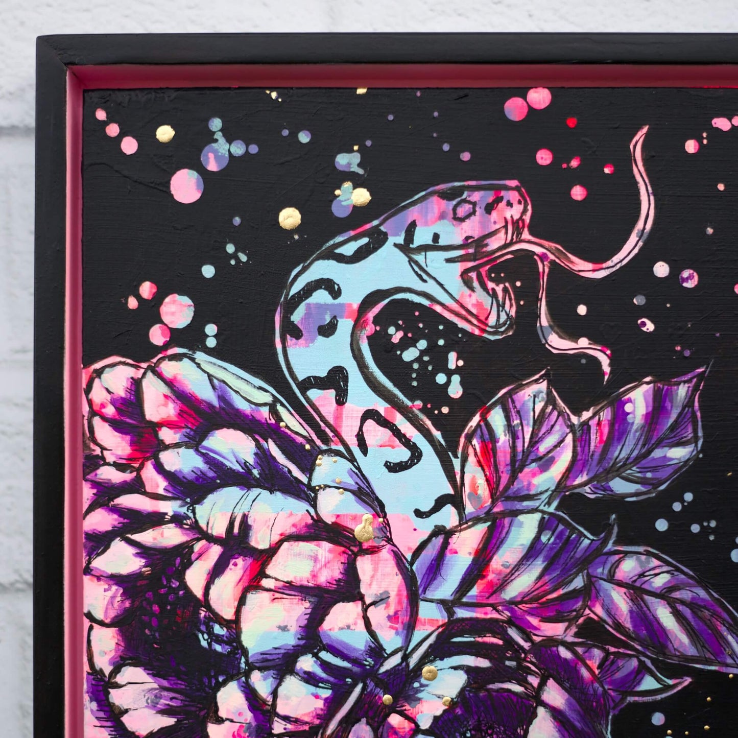 Original snake wrapped in floral painting, high contrast black and pink artwork symbolizing danger and beauty