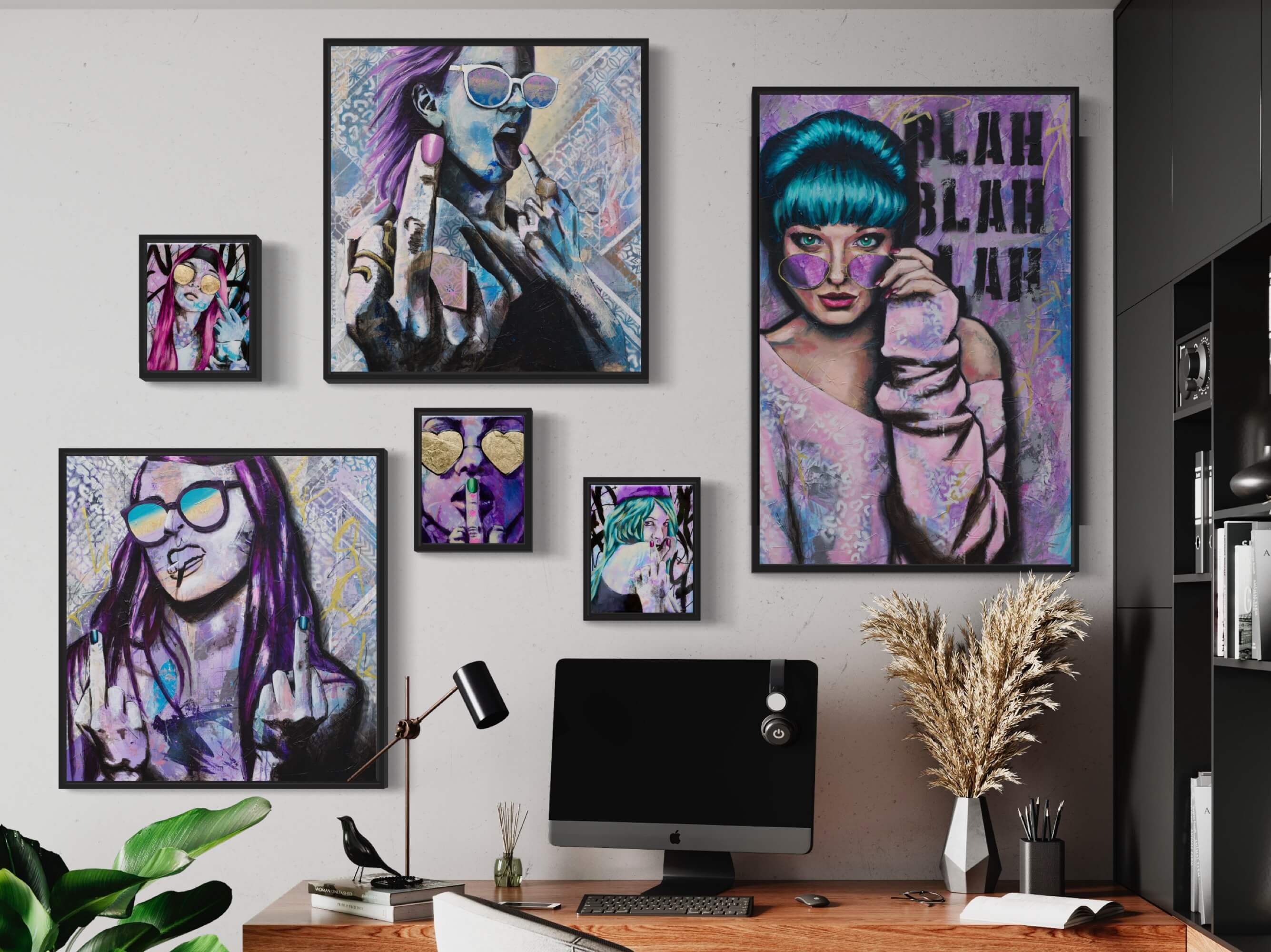paintings of bold women with attitude some ar flipping the bird displayed on an office wall
