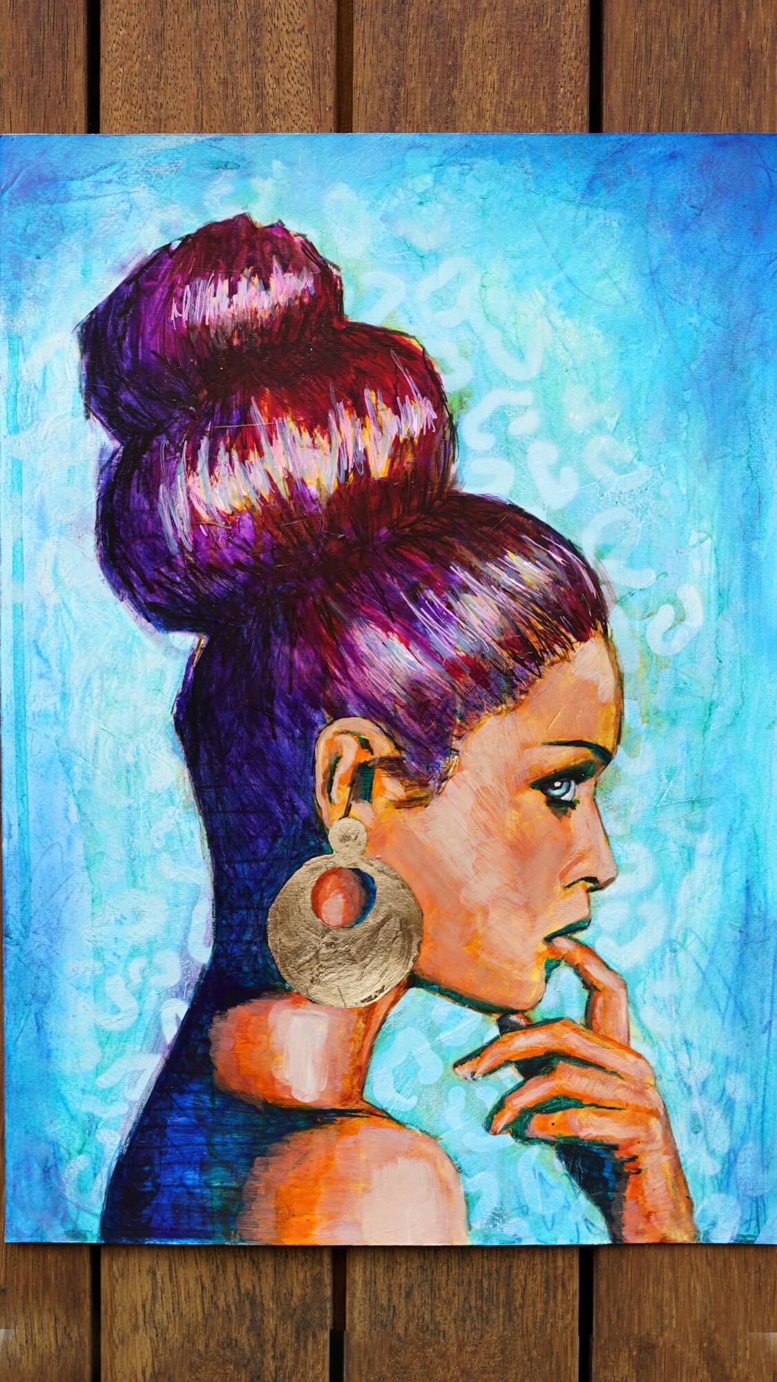 painting of a woman with tall hair bun orange with blue background