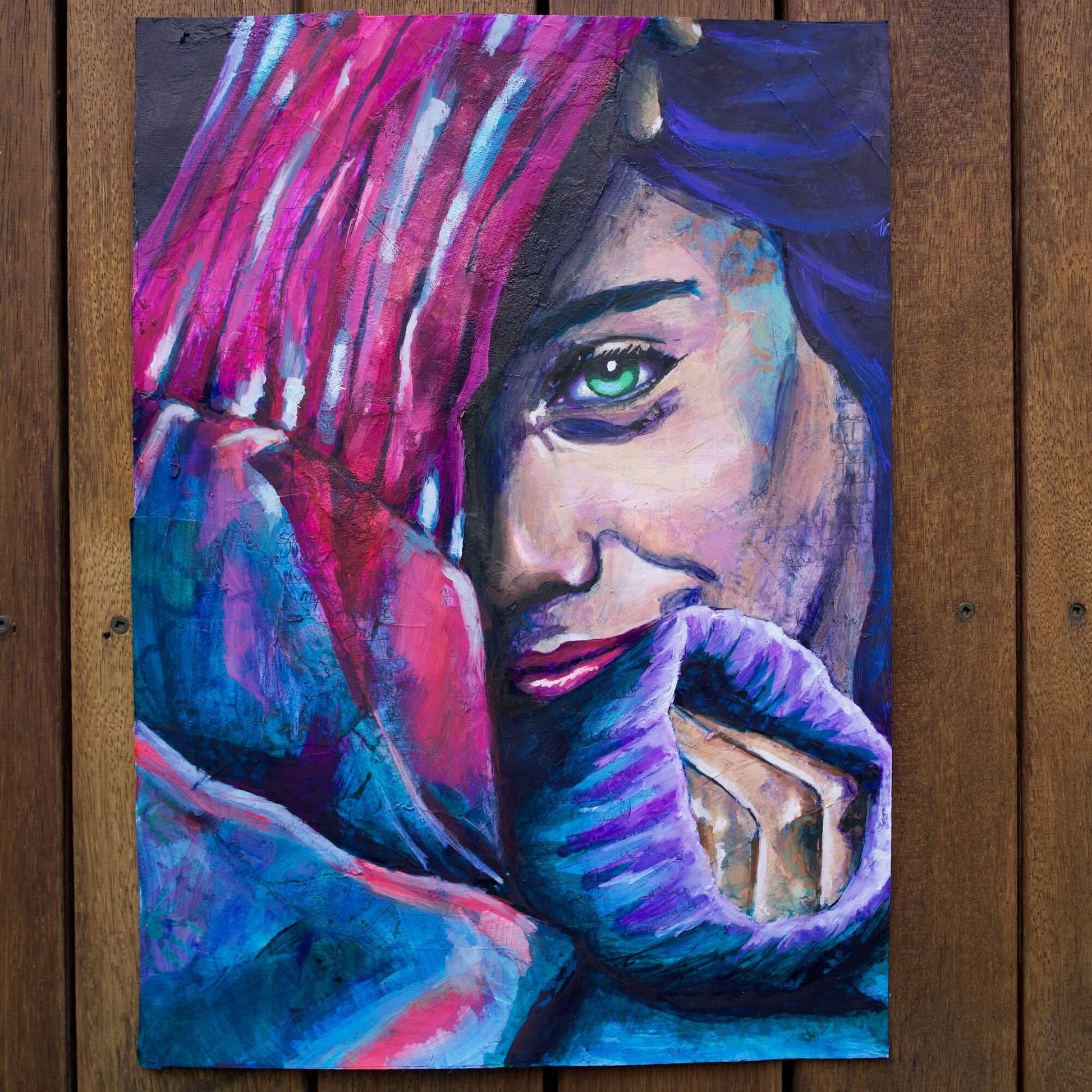 Mixed media painting of a woman wearing a sweater in pink and blue