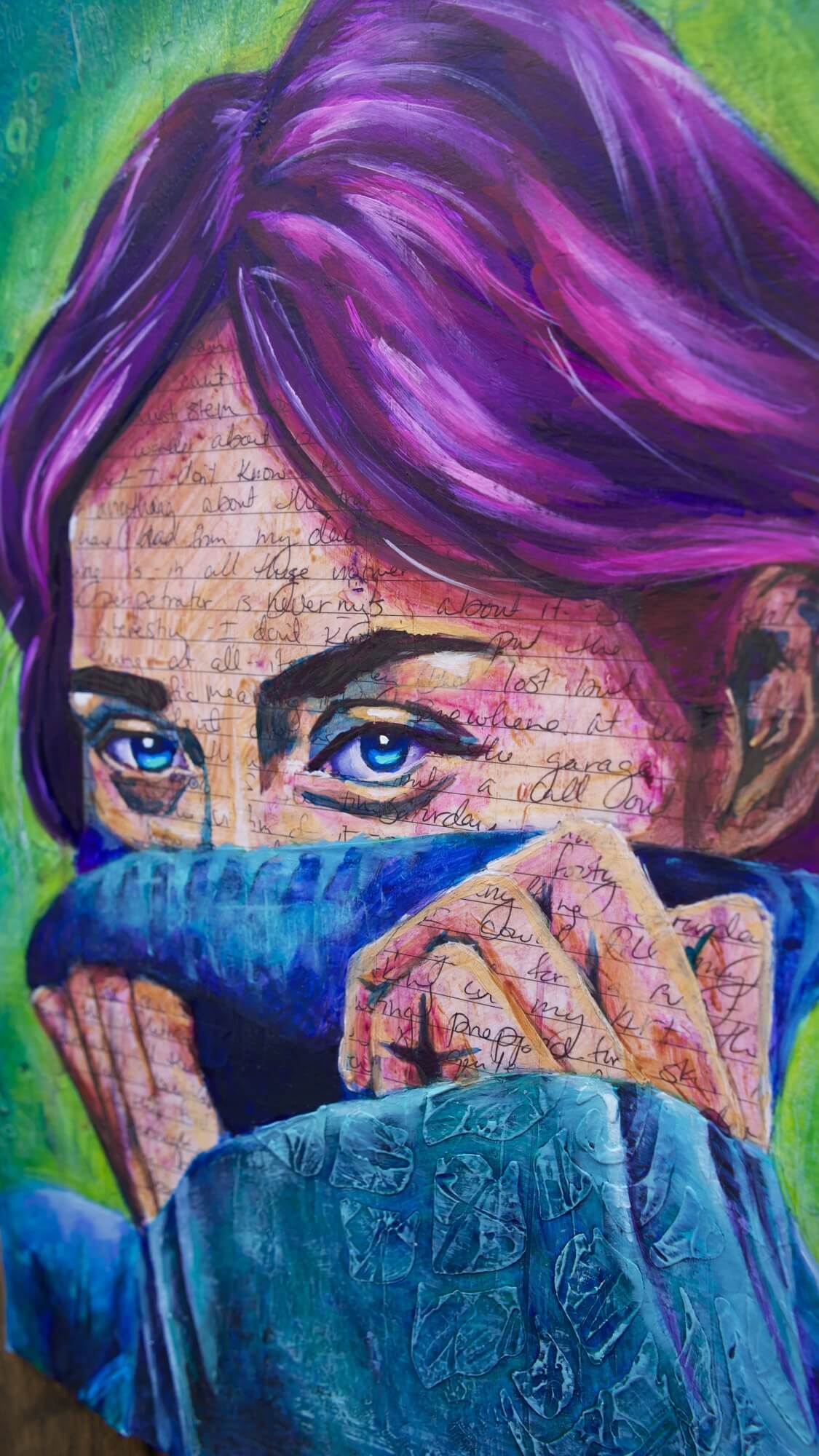 mixed media portrait of a woman with writing on her skin with purple hair